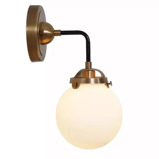 Elegant Brass and Glass Single Bulb Wall Sconce "Elegant brass and glass globe single bulb sputnik wall sconce with a mid-century design, featuring a matte white glass globe.
